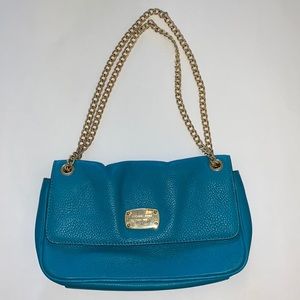 EUC Michael Kors teal with gold colored chain purse / clutch